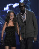 Anahi and rapper Snoop Dogg present the Video Del Ano award onstage at the MTV 2009 Latin America Awards