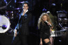 Gabe Saporta of Cobra Starship and Paulina Rubio perform at the MTV 2009 Latin America Awards