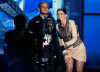 Nelly Furtado with Rapper Residente speak onstage at the MTV 2009 Latin America Awards