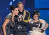 Nelly Furtado with Rapper Residente and singer Amandititita speak onstage at the MTV 2009 Latin America Awards