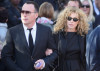 David Furnish and Kelly Hoppen attend the funeral of Boyzone singer Stephen Gately at St Laurence O'Toole Church on October 17th 2009 in Dublin Ireland