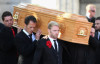 Keith Duffy and Ronan Keating carry out the coffin after the funeral of Boyzone singer Stephen Gately at St Laurence O'Toole Church on October 17th 2009 in Dublin Ireland