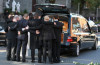 Ronan Keating, Mikey Graham, Shane Lynch and Keith Duffy look at coffin of Boyzone singer Stephen Gately at St Laurence O'Toole Church on October 17th 2009 in Dublin Ireland