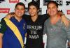 DJ Jesus Luz picture wearing a black tshirt with Jesus Te Ama imprinted on it backstage with Titian and Bruno Degaspari during his performance on October 17th 2009