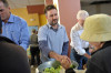 David Arquette passes out food to residents of Tenderloin district at the Feeding America Food Bank on October 22nd 2009 in San Francisco California 7