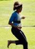 First Lady Michelle Obama takes participates in athletic activities on the White House South Lawn to promote physical fitness at the Healthy Kids Fair on October 21st 2009 10