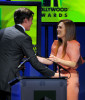 Nicholas Hoult presents the Supporting Actress award to Julianne Moore onstage during the 13th annual Hollywood Awards Gala Ceremony held at The Beverly Hilton Hotel on October 26th 2009 1