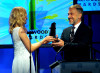 Diane Kruger presents the Supporting Actor award onstage during the 13th annual Hollywood Awards Gala Ceremony held at The Beverly Hilton Hotel on October 26th 2009 2