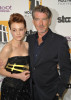 Pierce Brosnan with Carey Mulligan in the press room during the 13th annual Hollywood Awards Gala Ceremony held at The Beverly Hilton Hotel on October 26th 2009 3