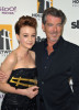 Pierce Brosnan with Carey Mulligan in the press room during the 13th annual Hollywood Awards Gala Ceremony held at The Beverly Hilton Hotel on October 26th 2009 2