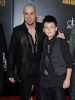 Chris Daughtry arrives at the 2009 American Music Awards at the Nokia Theatre LA in Los Angeles California on November 22nd 2009 accompanied by his son Griffin