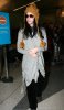 Katy Perry seen wearing a kintted honey brown hat at LAX Airport on December 24th 2009 1