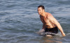 Hugh Jackman spotted swimming at the beach with his kids in Brazil on January 12th 2010 5