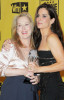 Meryl Streep and Sandra Bullock pose with Best Actress award in the press room during the 15th annual Critics Choice Movie Awards on January 15th 2010 at the Hollywood Palladium 2