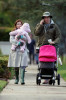 Alyson Hannigan and husband Alexis Denisof spotted together on January 19th 2010 walking with their baby daughter under the rain 1