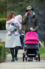 Alyson Hannigan and husband Alexis Denisof spotted together on January 19th 2010 walking with their baby daughter under the rain 5