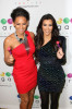 Melanie Brown and Kim Kardashian at Guys and Dolls nightclub in West Hollywood on January 19th 2010 for the launch of The Sugar Factorys Couture Pops 5