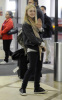 Dakota Fanning spotted on January 25th 2010 arriving at LAX Airport in California 4