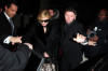 Madonna leaves Scotts restaurant after having dinner with Tom Ford on January 26th 2010 surrounded by bodyguards 4