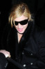 Madonna leaves Scotts restaurant after having dinner with Tom Ford on January 26th 2010 surrounded by bodyguards 2