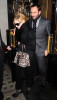 Madonna leaves Scotts restaurant after having dinner with Tom Ford on January 26th 2010 surrounded by bodyguards 3