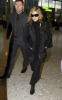 Madonna spotted on January 29th 2010 as she was about to catch a flight from Londons Heathrow Airport to New York City 4