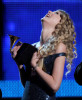 Taylor Swift accepts the award onstage during the 52nd Annual GRAMMY Awards held at Staples Center on January 31st 2010 in Los Angeles California 3