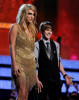 Justin Bieber with singer KeSha onstage during the 52nd Annual GRAMMY Awards held at Staples Center on January 31st 2010 in Los Angeles California 4