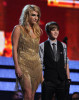 Justin Bieber with singer KeSha onstage during the 52nd Annual GRAMMY Awards held at Staples Center on January 31st 2010 in Los Angeles California 3