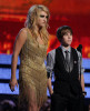 Justin Bieber with singer KeSha onstage during the 52nd Annual GRAMMY Awards held at Staples Center on January 31st 2010 in Los Angeles California 1