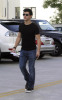 Taylor Lautner spotted walking the streets on January 9th 2010 wearing a black tshirt and sunglasses 2