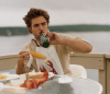 Robert Pattinson photo shoot of December 2009 issue of Vanity Fair Magazine eating a meal 2