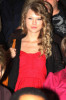 Taylor Swift spotted on February 5th 2010 as she arrives at Sydney Airport wearing a red cute dress 4