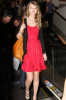 Taylor Swift spotted on February 5th 2010 as she arrives at Sydney Airport wearing a red cute dress 2