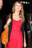 Taylor Swift spotted on February 5th 2010 as she arrives at Sydney Airport wearing a red cute dress 1