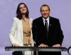 Anne Hathaway and Tom Sherak speak at the 82nd Academy Awards nominations announcement held at the Samuel Goldwyn Theater on February 2nd 2010 in Beverly Hills 3