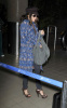 Fergie spotted arriving at LAX International Airport on February 3rd 2010 wearing a long blue knit coat 1