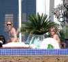 Sheryl Crowe with Jennifer Aniston spotted at the pool side with friends during Jens 41st birthday on February 5th 2010 in Cabo San Lucas Mexico 2