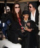 Angelina Jolie with Brad Pitt and their son Maddox spotted together on February 7th 2010 while leaving Super Bowl XLIV at the Sun Life Stadium in Miami Gardens Florida 2