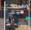 Robert Pattinson spotted getting food from Nandos restaurant as well as shopping at some local stores on February 6th 2010 in London 4