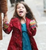 Suri Cruise seen enjoying the snow as she walks with her mom on February 10th 2010 in New York City 1