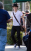 Nick Jonas was spotted arriving to have lunch at a Los Angeles local restaurant on February 12th 2010 wearing a casual white tshirt and black pants 2