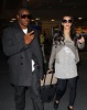 Kim Kardashian and Reggie Bush spotted at McCarron International Airport on February 13th 2010 in Las Vegas Nevada 3