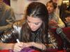 Lara Scandar at her CD release Mission is You held on February 3rd 2010 at Virgin Mega Stores in Cairo Egypt while signing autograhs for her fans 6