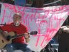 Mehdi Bahmed playing his guitar on stage