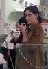 Katie Holmes spotted at Magnolias Bakery with friends on February 11th 2010 weaing a stylish brown coat 2