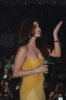 Haifa Wehbe photo while performing on stage at her 2010 valentines concert wearing a yellow dress 4