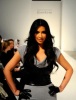 Kim Kardashian spotted at the Bebe Fall fashion show on February 16th 2010 wearing a gray short dress 9