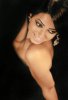 picture of Iraqi student Rahma Mezher as a model photo shoot backless black top