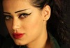 picture of Iraqi student Rahma Mezher as a model photo shoot wearing red lipstick